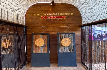 Axe throwing activity at Whitewater Bar & Grill